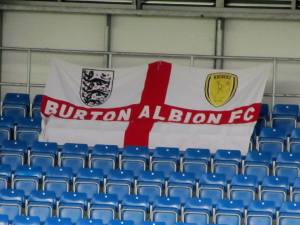 A Burton flag on the away stand