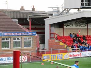 The old stand can be seen behind the new one!