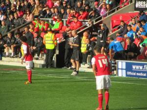 Paul Cook on the touchline