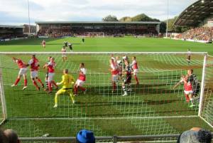 Liam Cooper jumps highest and puts the Spireites in front