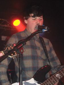 Tyler is the bands current bassist and backing vocalist