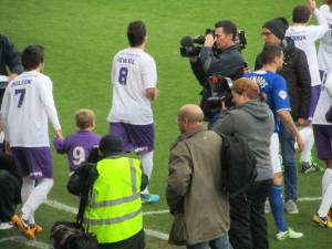 The players make their way on to the pitch