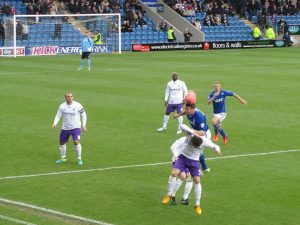 Marc Richards wins a header