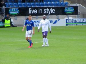 Marcel Simpson marks Eoin Doyle