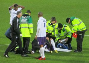 A Daventry player has to be stretchered off