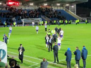 The visitors leave the pitch after the biggest game in their history
