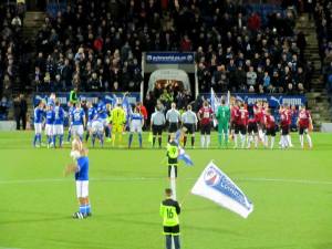 The two teams line up