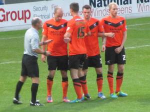 The referee organises the wall