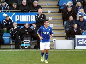 Gary Roberts is watched by Paul Cook