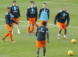 The visitors warm up