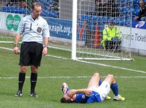 Gary Roberts goes down injured