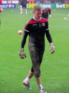 George Long gets a bit muddy in the warm up