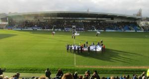 The players make their way on to the field