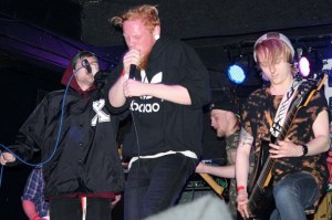 Joe Hallam (centre) performs his final show with Or Die Trying
