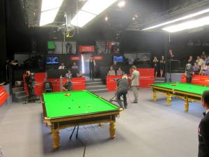 Judd Trump makes his way into the venue