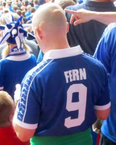 A retro shirt with the name of Rodney Fern on the back
