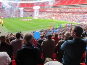 The players make their way on to the pitch