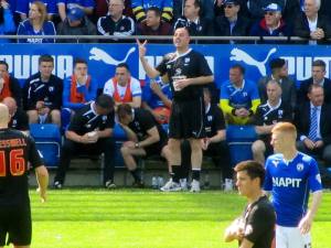 Paul Cook shouts orders from the touchline