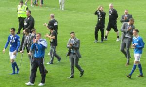 The players applaud the fans