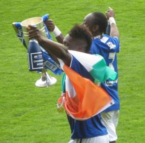 Gnanduillet and Smith with the trophy