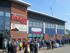 Fans arrive at the stadium