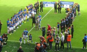 A guard of honour welcomes Leon Osman for his testimonial