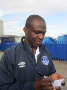 Arouna Kone signs autographs