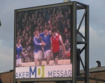 Some highlights from Moss' career are shown on the big screen